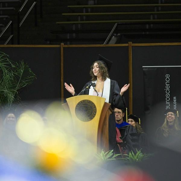 Undergraduate speaker Isabella Oldenburg addresses her classmates