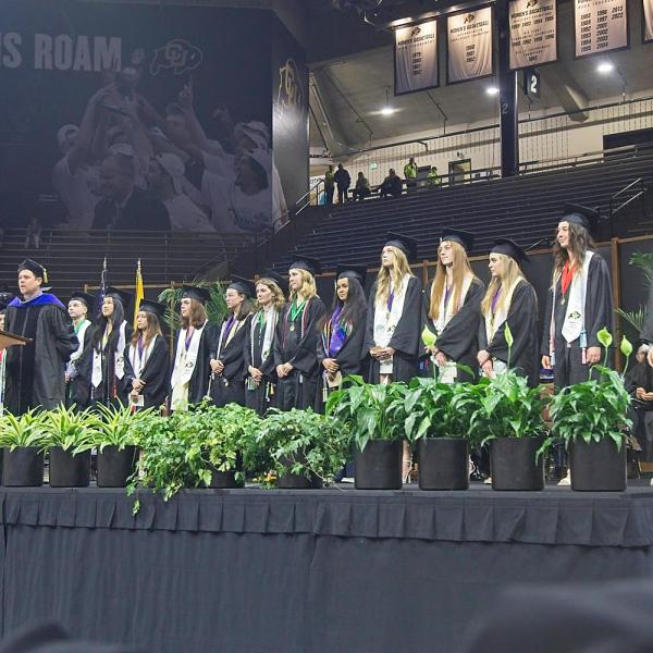 Honors advisor Mike Baratta announces those graduating with Latin Honors