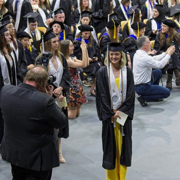 Formal photos were taken of the students before and after they crossed the stage
