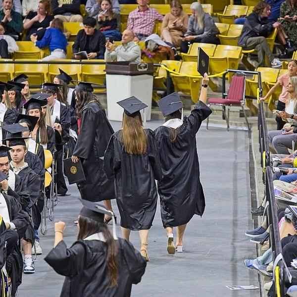 These BFFs celebrate after crossing the stage. When I looked at this photo, the song "We're off to see the Wizard" came to mind.