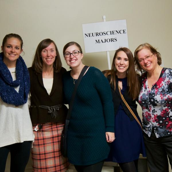 Some of the staff who helped are all smiles as the ceremony is near commencing