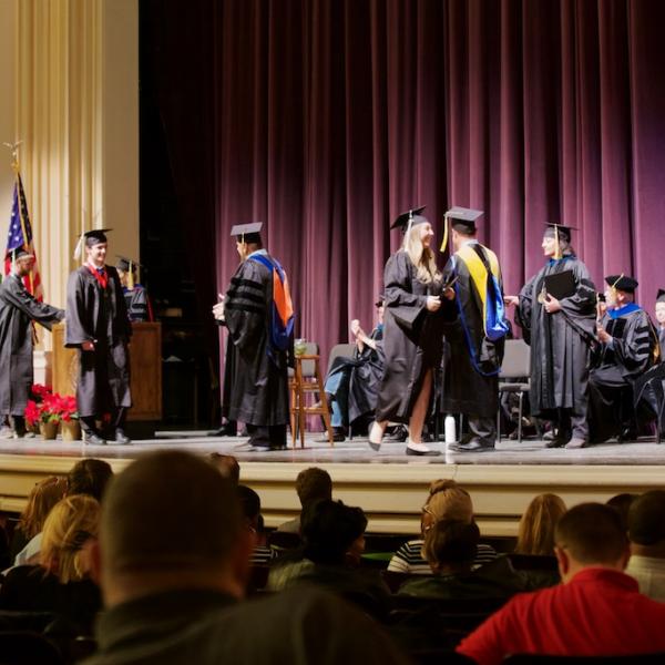 And more graduates cross the stage