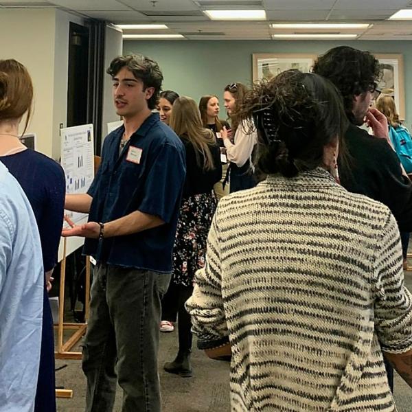 Despite the lower-than-usual number of posters this year, a lively crowd attended