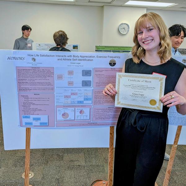 Grace Leger with her poster