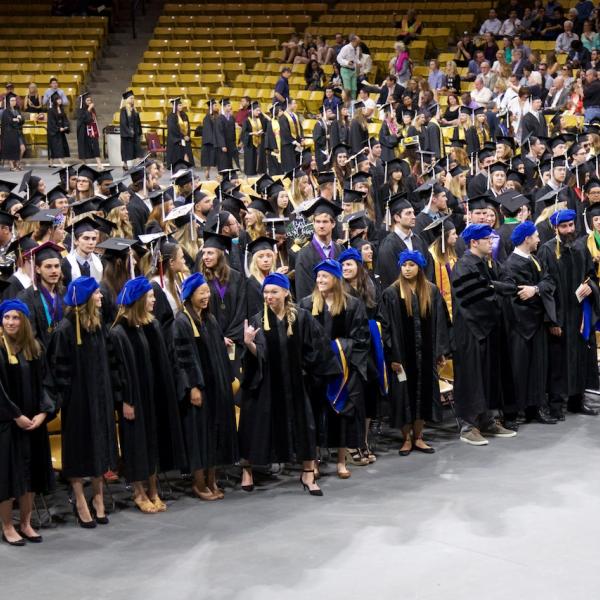 The PhDs (front row, floppy blue hats) took a whole row themselves