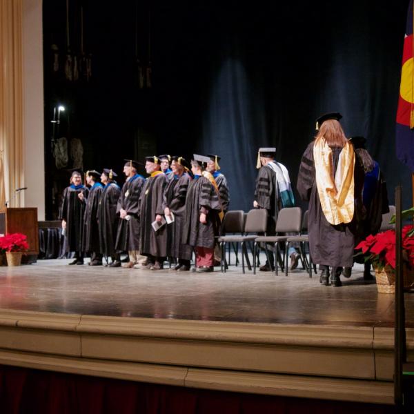 The faculty process onto the stage