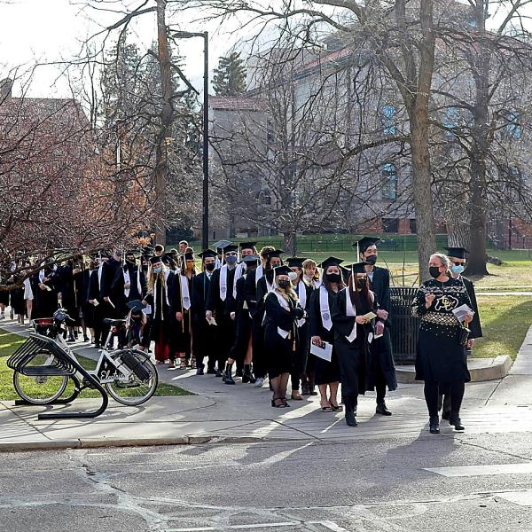 The undergraduates move from Eaton towards Macky for the processional