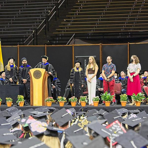 Director of Graduate Studies Professor Ryan Bachtell announces the department's graduate awardees.