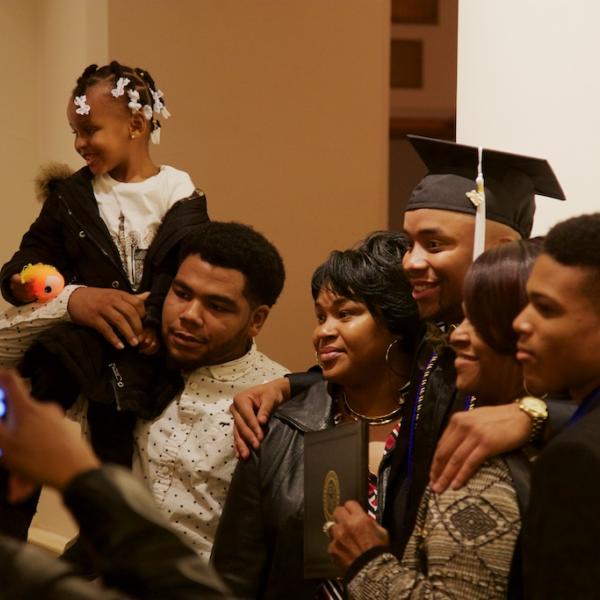 A happy graduate; and this little girl was so excited to be there