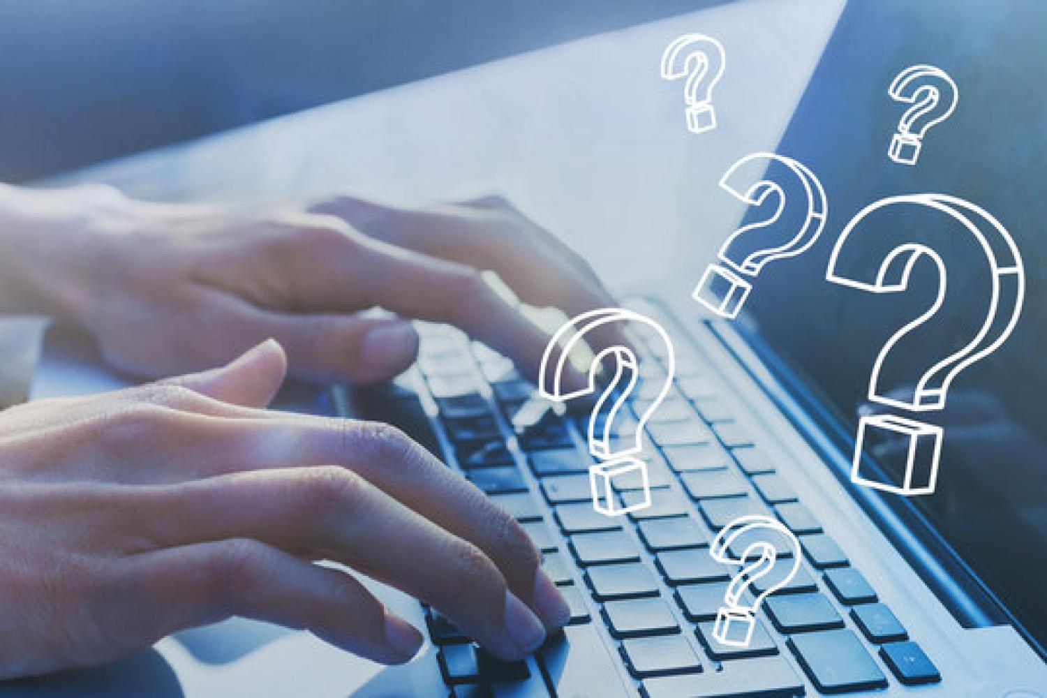 Hands typing on keyboard