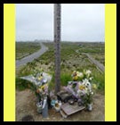 photo of memorial after earthquake with flowers 