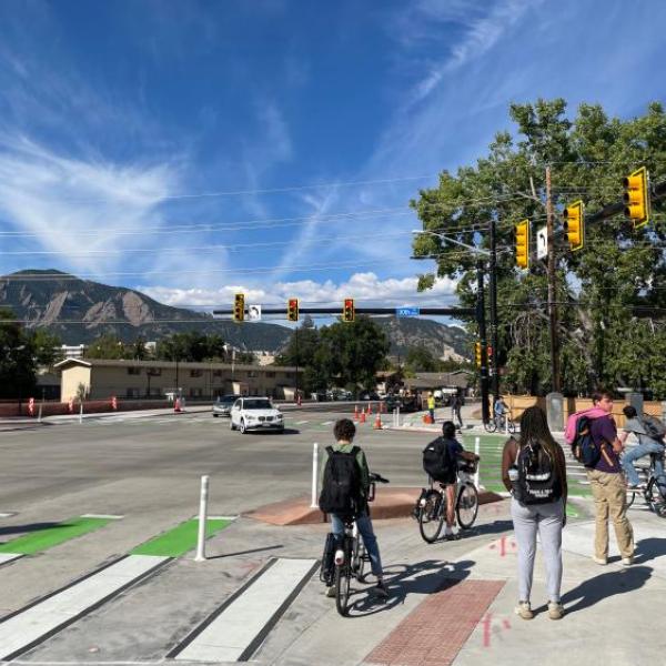 Students crossing the intersection on 30th and Colorado Ave