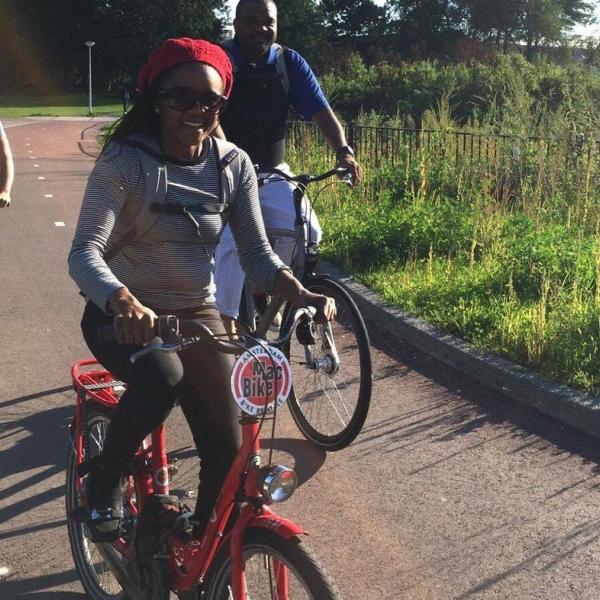 Woman riding her bike with friends.