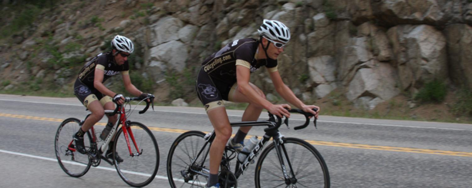 Two bicyclists riding along a Buff Bike Classic route.