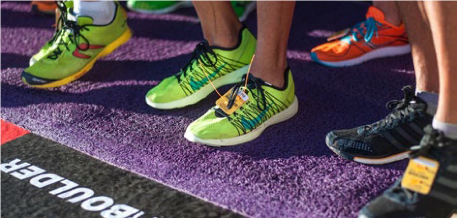 Photo of runners feet at the BolderBOULDER start line