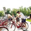 Riders undock bicycles from a BCycle station.