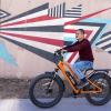 Man riding an electric bicycle.