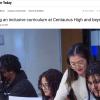 five students look at documents
