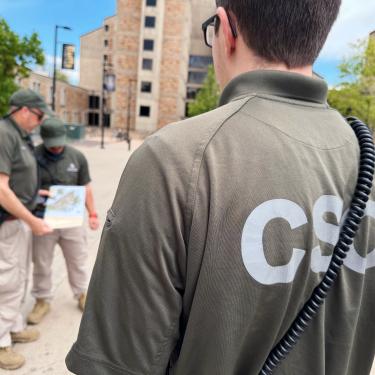 Campus security liaisons working an event
