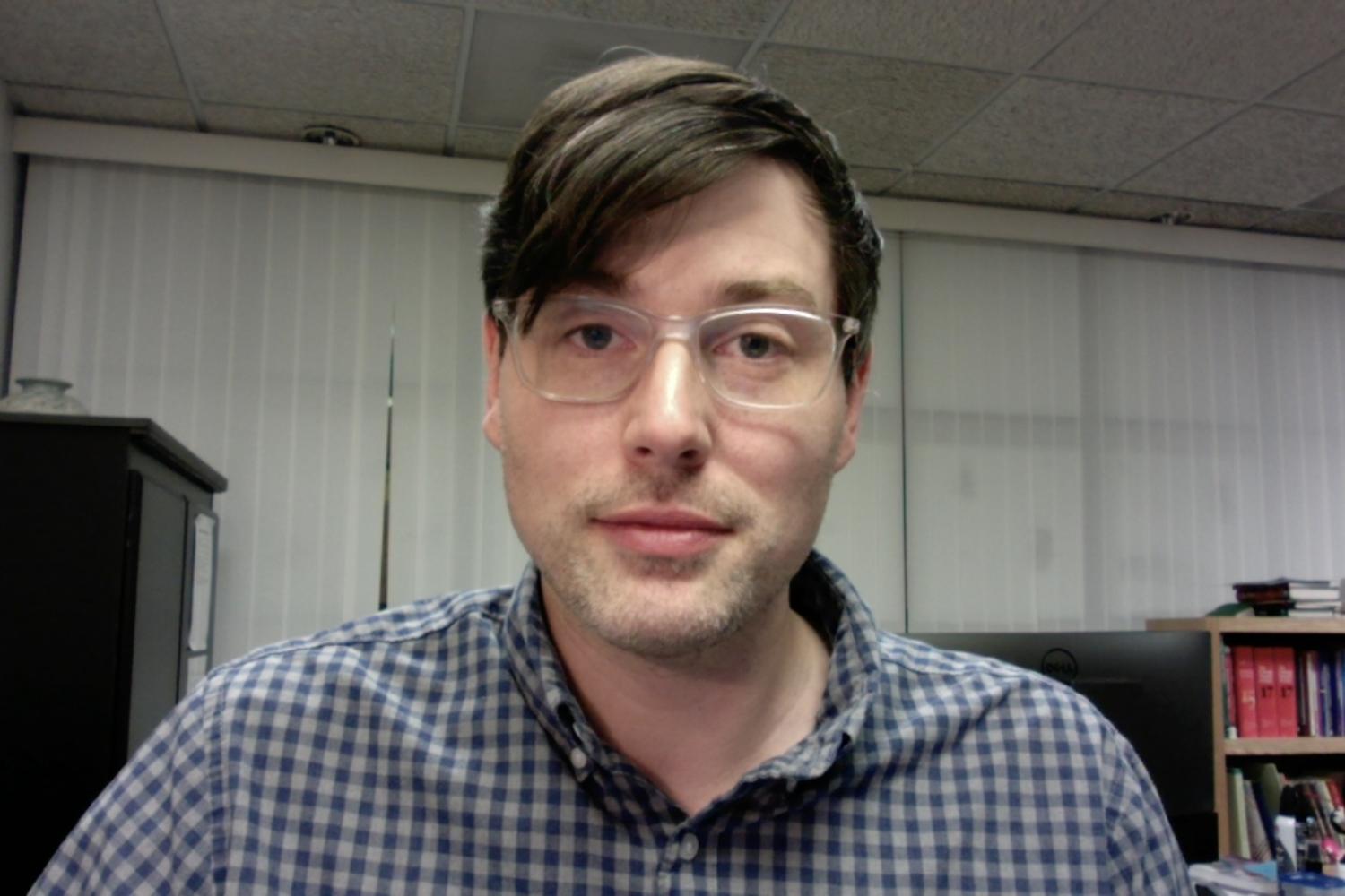 Chris Benson sitting at a computer