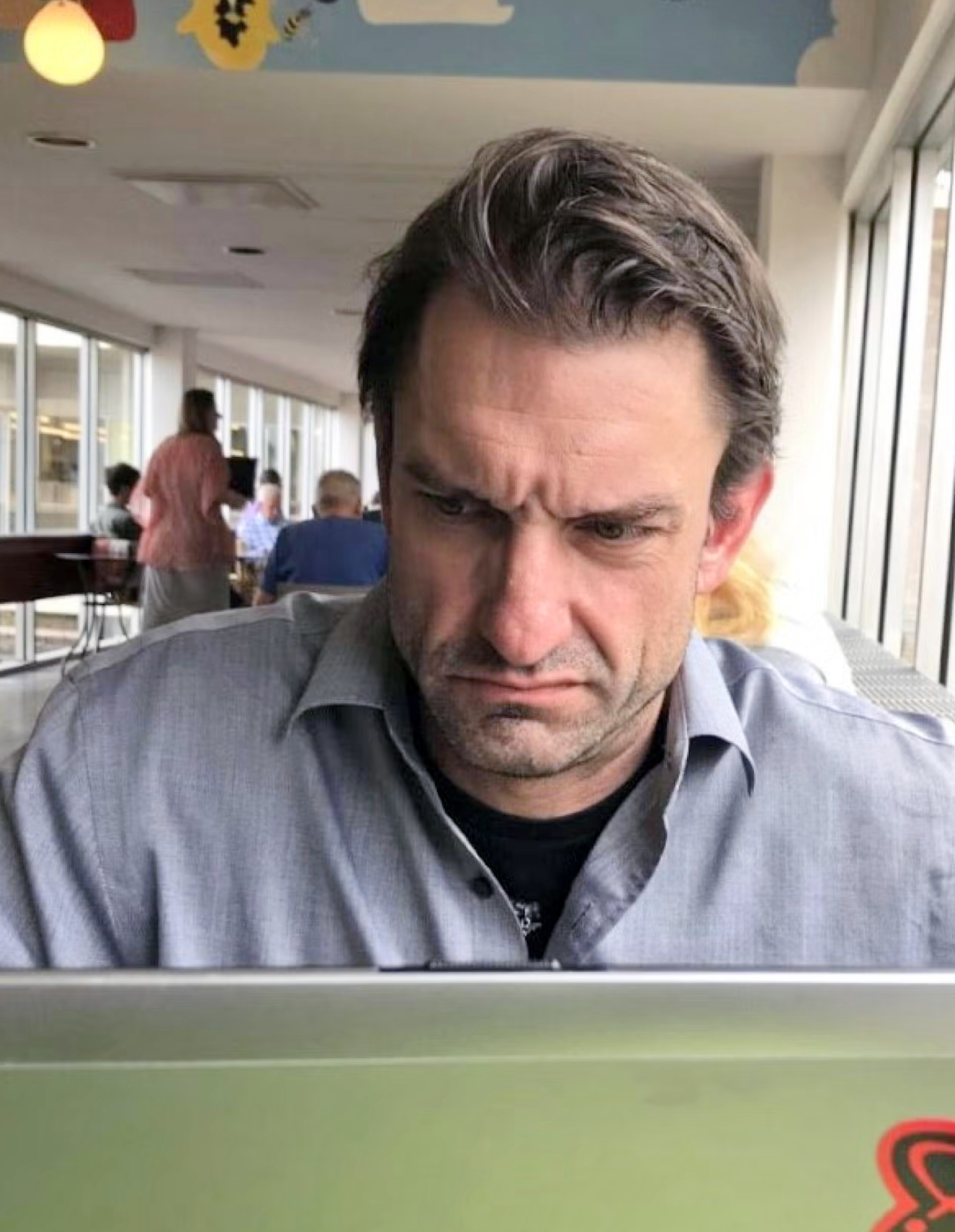 Alexander Fobes working in a diner