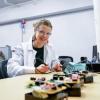 Researcher working in the lab to build sensors