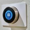 Smart thermostat on a wall