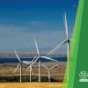 Wind turbines in the background with conference title and logo 