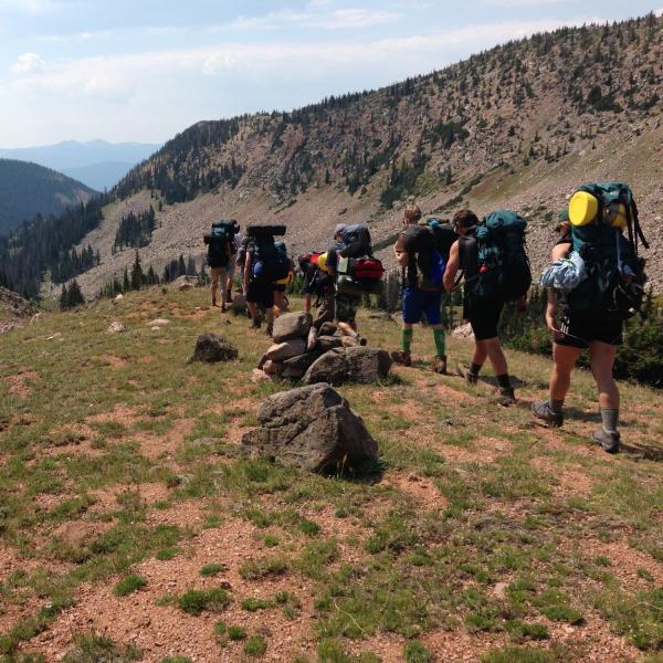 hiking and backpacking students in the mountains