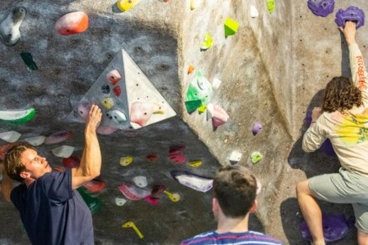 Students indoor rock climbing