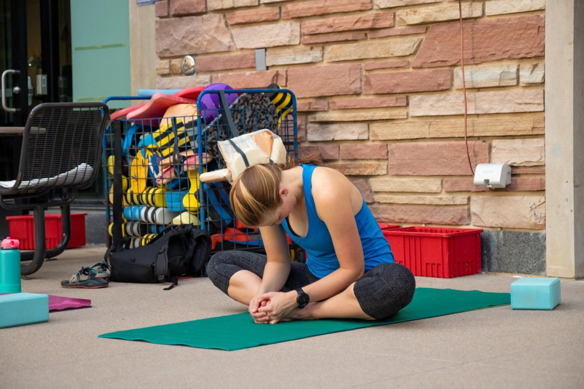 lone woman doing yoga