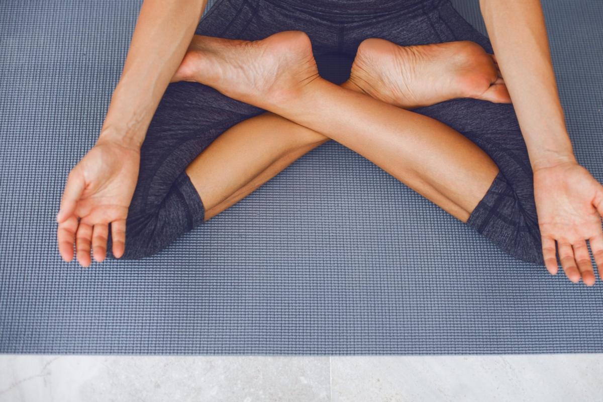 legs crossed as someone meditates