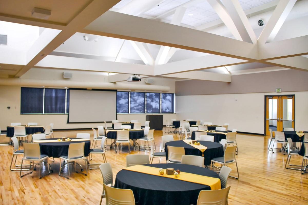 large meeting room with round tables