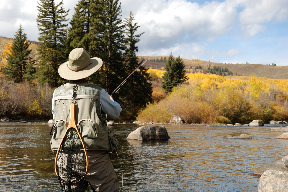 man fly fishing