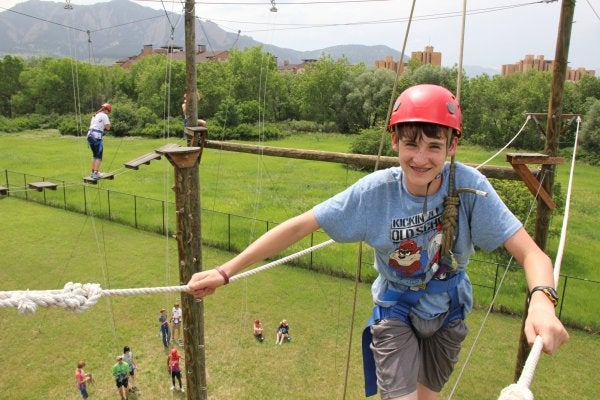 student on the climbing course experience