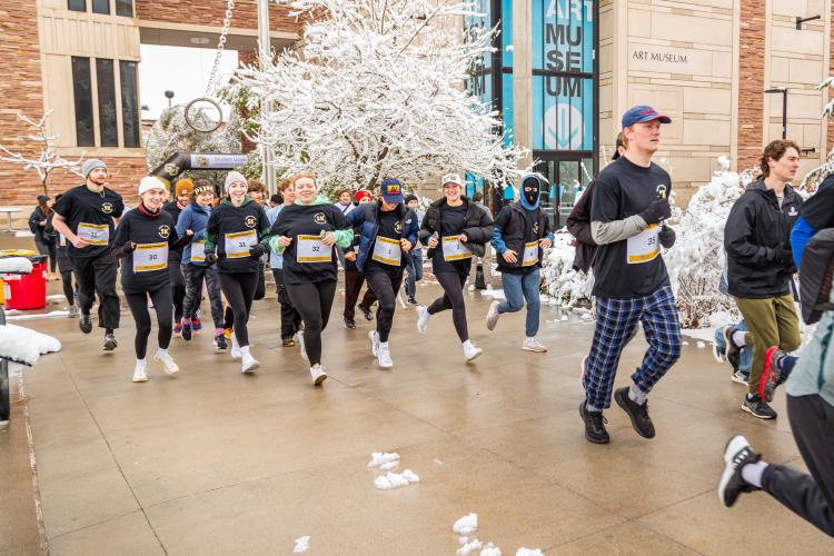 CU students running a 5K