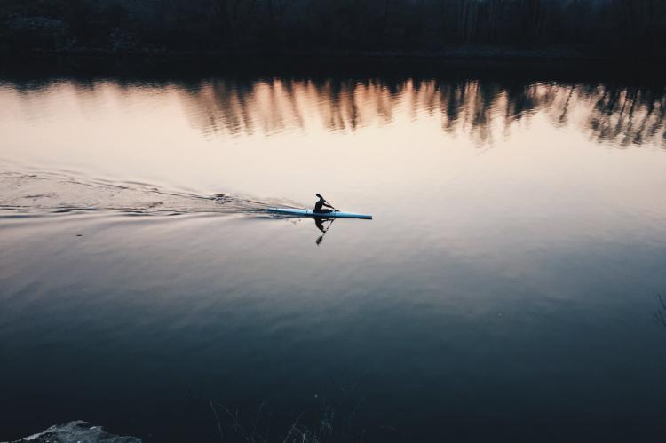 lone kayaker on the open water