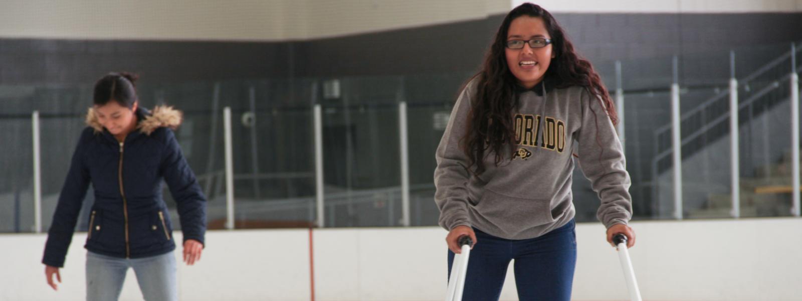 Woman skating on ice rink
