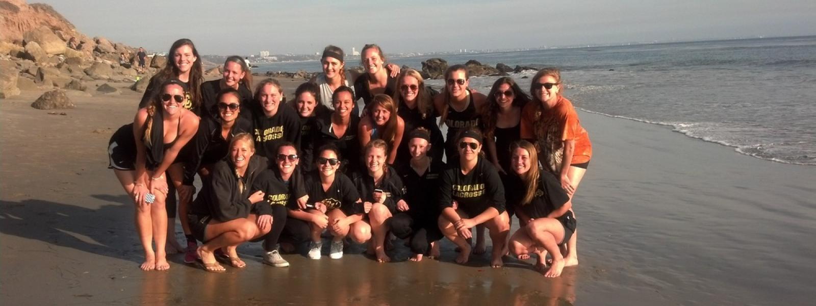Lacrosse women's team on the beach