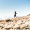 man running alone on hillside