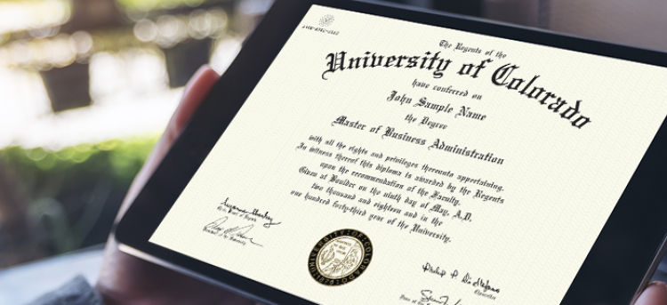 Close-up of a tablet displaying a sample University of Colorado CeDiploma.