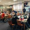 Photo of iSAT researchers leading a DPS teacher workshop. 