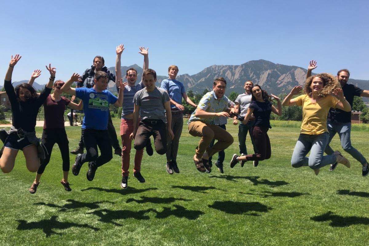 Team picture. All are jumping