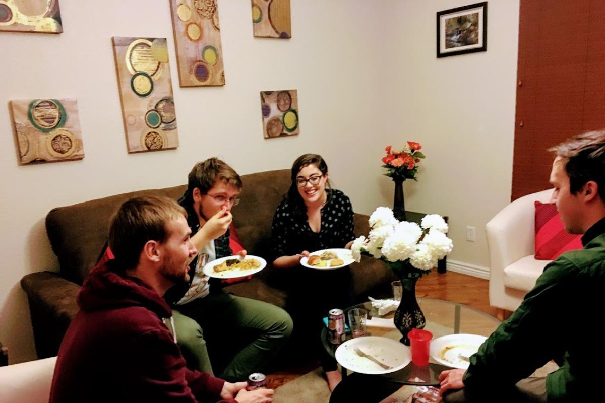 People eating at the holiday party