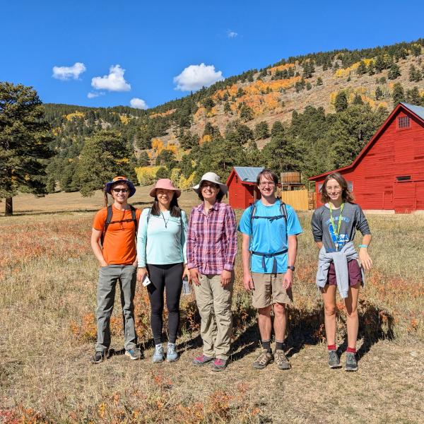 people in front of a barn at Caribou Ranch