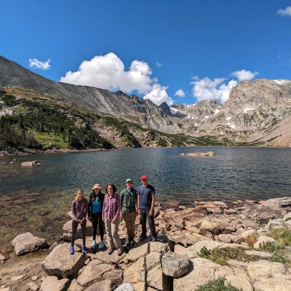 people in front of Lake Isabelle
