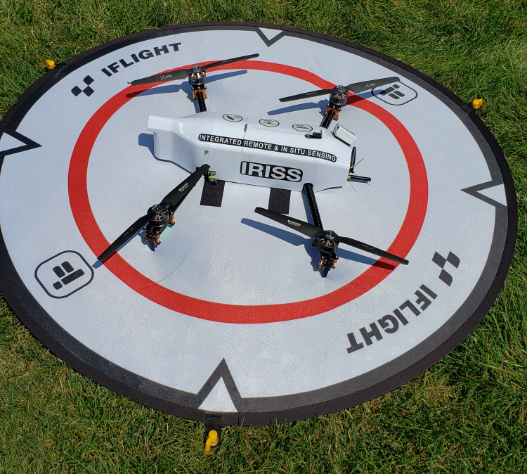 IRISS Coptersonde on a landing pad in the grass