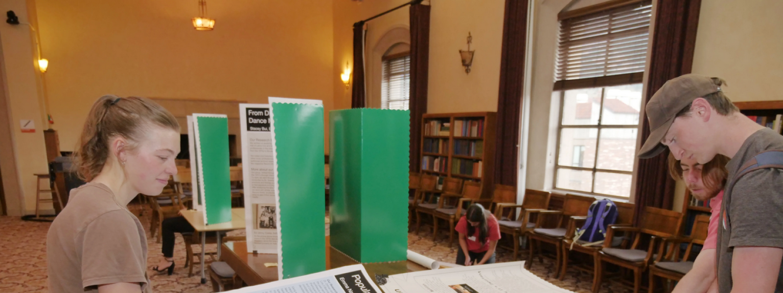 students preparing poster