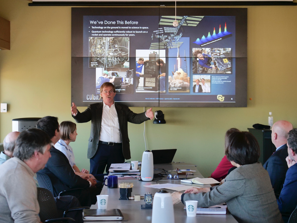 Professor Dana Anderson (Physics) presents to DOD undersecretary Heidi Shyu and campus leadership