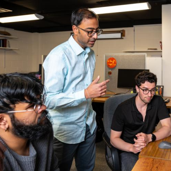 Debanjan Mukherjee and research assistant Ricardo Roopnarinesingh, left, and graduate student Nick Rovito in Mukherjee's computing lab